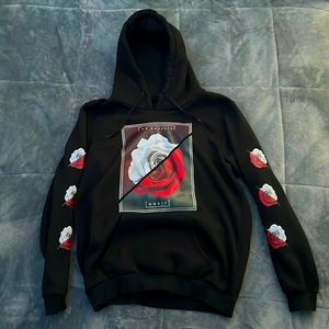 I am selling a black ROMWE sweatshirt